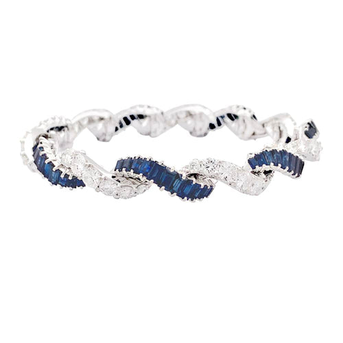 Bracelet Bracelet articulé en or blanc 750 serti de diamants et saphirs 58 Facettes 33891