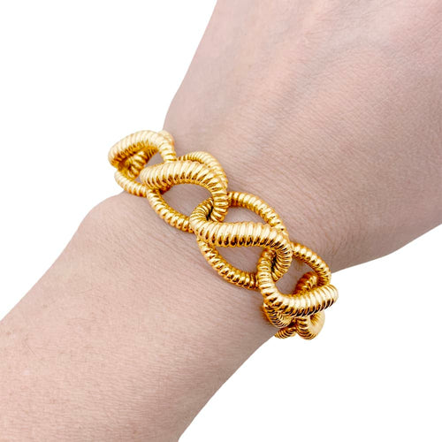Bracelet Mellerio - Bracelet vintage à maillons torsadés en or jaune 18 carats 58 Facettes 35262