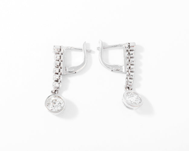 Boucles d'oreilles Boucles d'oreilles dormeuses en platine et diamants taille ancienne 0,70 ct 58 Facettes 1