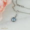 https://cdn.shopify.com/s/files/1/0442/6560/3235/files/wunderschones-weissgold-collier-mit-aquamarin-and-brillanten-honey-decoration-7.jpg?v=1710848072