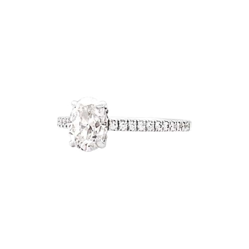 Bague 50 Bague solitaire en or blanc 750 avec diamant ovale 1 ct 58 Facettes 35329