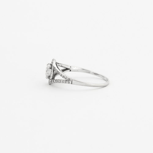 Bague 51 Bague en or gris ajouré, centrée d'un diamant taille brillant 58 Facettes DV0327-2
