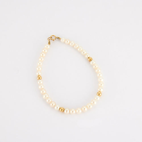Bracelet Bracelet perles blanches et or jaune 58 Facettes P4L8