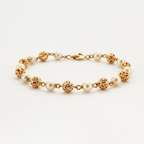 Bracelet Bracelet composé de perles en or jaune 58 Facettes DV0534-10