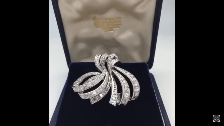 Clip Double clip Boucheron, "Noeud" en platine, or blanc et diamants. 58 Facettes 27909