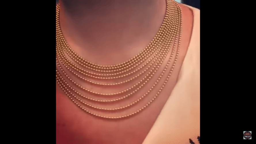 Collier Collier Cartier, "Draperie", en or jaune. 58 Facettes 28500
