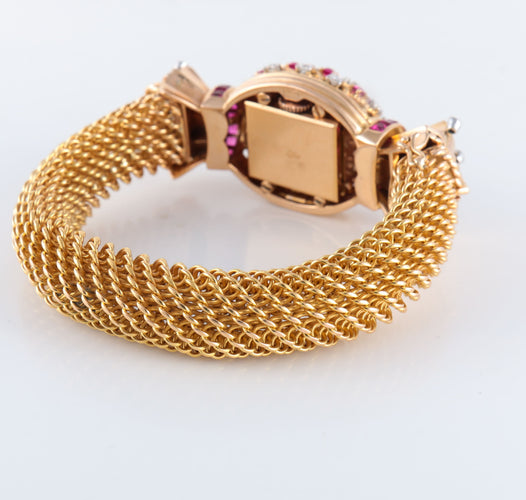Montre Montre Bracelet Vintage en Or, Rubis et Diamants 58 Facettes