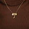 Collier Collier Pendentif motif feuillagé 58 Facettes