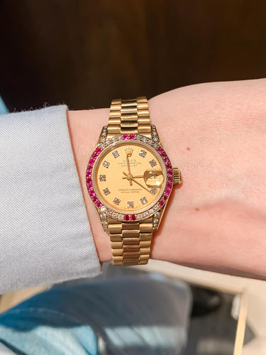 Montre Montre Rolex Président or jaune, diamants et rubis 58 Facettes