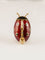 Broche Boucheron - Broche Coccinelle en or jaune, émail et diamants 58 Facettes