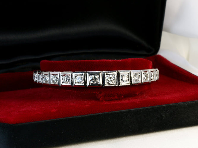 Bracelet Bracelet rivière articulé en or, platine et diamants 58 Facettes 389