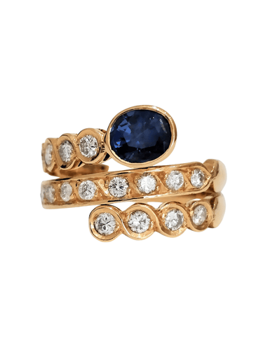 Bague 57 Bague "enroulement" or jaune saphir et diamants 58 Facettes 1-144/2