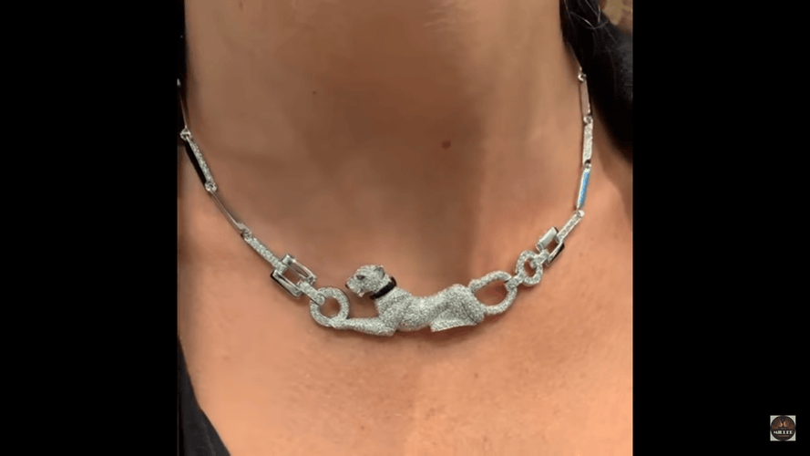 Collier Collier Cartier "Panthère" en or blanc, diamants, émeraude et onyx. 58 Facettes 29385