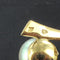 Pendentif Pendentif or perle grise 58 Facettes 17-064A