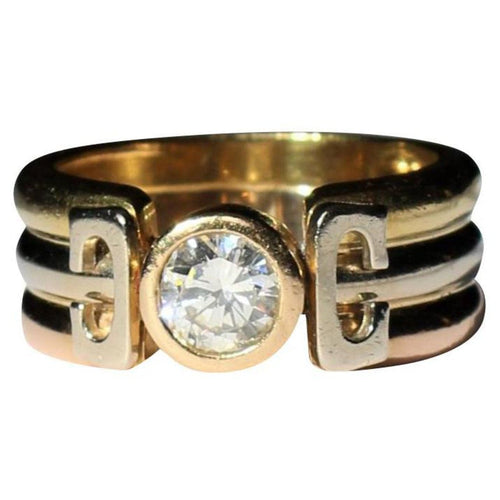 Bague Bague trois Ors sertie d'un diamant 58 Facettes 355