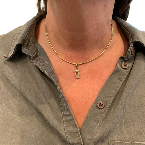 Collier Collier Cartier "Double C" en or jaune et diamants. 58 Facettes 30408