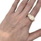 Bague 67 Bague Cartier modèle "Panthère" en or jaune, onyx, émeraudes et diamants. 58 Facettes 29715-1