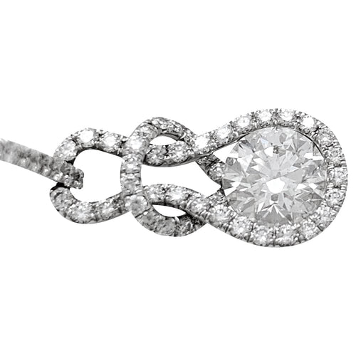 Boucles d'oreilles Boucles d'oreilles "Noeud d'Héraclès" en or blanc et diamants. 58 Facettes 29979