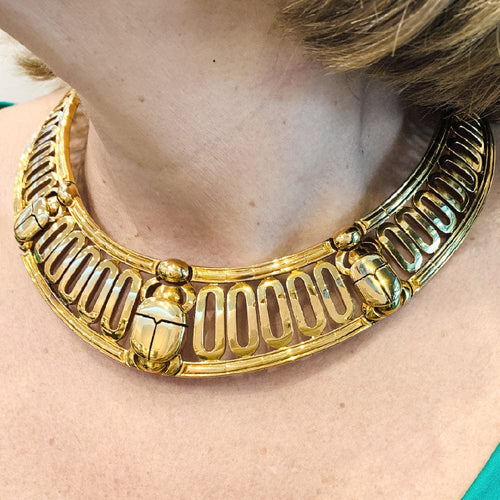 Collier Collier torque Cartier, "Scarabée", en or jaune. 58 Facettes 29929