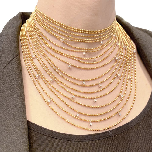 Collier Collier Cartier "Draperie" en or jaune, or blanc et diamants. 58 Facettes 29547