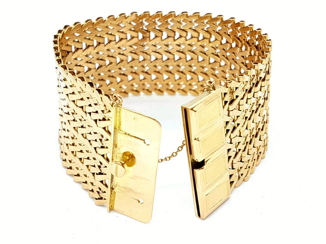 Bracelet Bracelet Manchette Or jaune 58 Facettes 00035CN