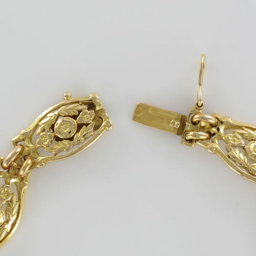 Bracelet Bracelet ancien en or motifs floraux 58 Facettes 17-348