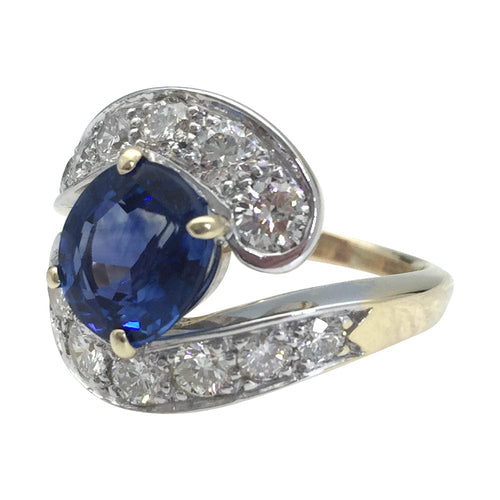 Bague 52 Bague Tourbillon en or jaune et blanc, saphir et diamants. 58 Facettes 28146