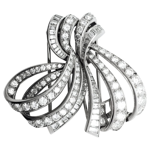 Clip Double clip Boucheron, "Noeud" en platine, or blanc et diamants. 58 Facettes 27909