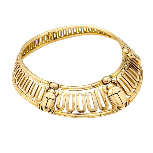 Collier Collier torque Cartier, "Scarabée", en or jaune. 58 Facettes 29929