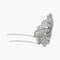 Broche Broche en or blanc, diamants brillants et baguettes. 58 Facettes 29031