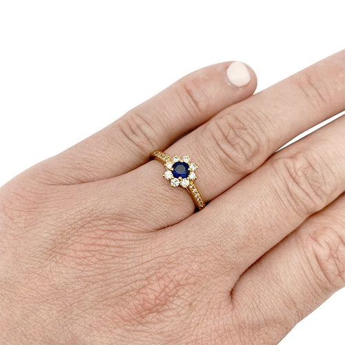 Bague 51 Bague Tiffany&Co. marguerite en or jaune diamants et saphir. 58 Facettes 30403