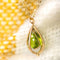 Pendentif Pendentif péridot et sa chaîne sertie d'opales 58 Facettes 18-379