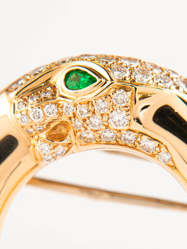 Broche Cartier - Broche Panthère, or jaune, diamants et émeraudes 58 Facettes