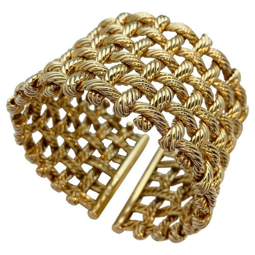 Bracelet Bracelet Manchette Hermès en or jaune. 58 Facettes 30059