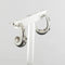 Boucles d'oreilles Boucles d'oreilles or blanc satiné diamants 58 Facettes YS66B