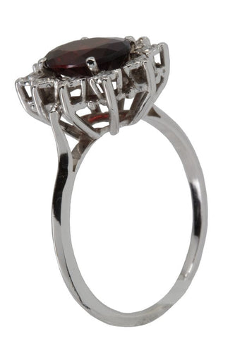 Bague Bague marguerite grenat et diamants 58 Facettes 037211