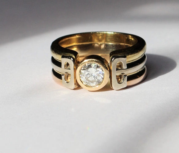 Bague Bague trois Ors sertie d'un diamant 58 Facettes 355