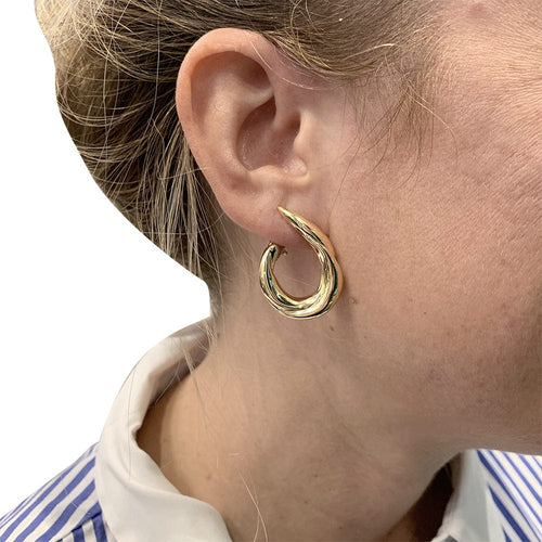 Boucles d'oreilles Boucles d'oreilles Boucheron, créoles, en or jaune. 58 Facettes 30025