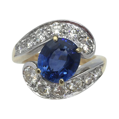 Bague 52 Bague Tourbillon en or jaune et blanc, saphir et diamants. 58 Facettes 28146