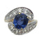 Bague 52 Bague Tourbillon en or jaune et blanc, saphir et diamants. 58 Facettes 28146
