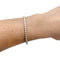 Bracelet Bracelet ligne Cartier "C de Cartier" en or blanc et diamants. 58 Facettes 30089