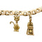Bracelet Bracelet breloques en or jaune, émail et saphir. 58 Facettes 30179
