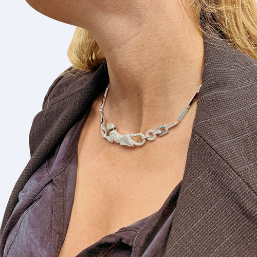 Collier Collier Cartier "Panthère" en or blanc, diamants, émeraude et onyx. 58 Facettes 29385