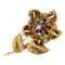 Broche Broche Cartier, "Fleur" en or jaune, diamants, émeraudes, rubis et saphirs. 58 Facettes 30236