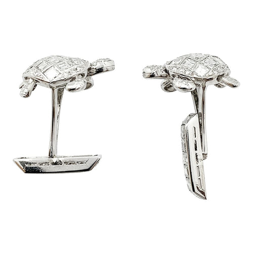 Boutons de manchette Boutons de manchette "Tortues" en platine, sertis de diamants. 58 Facettes 30067