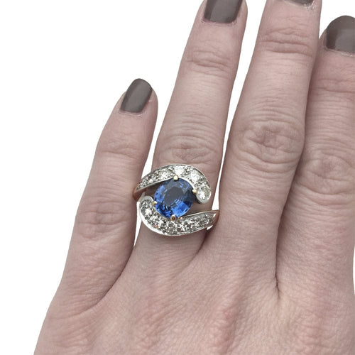 Bague 52 Bague Tourbillon en or jaune et blanc, saphir et diamants. 58 Facettes 28146