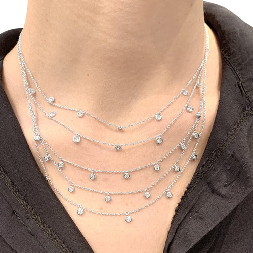 Collier Collier draperie en or blanc et diamants. 58 Facettes 29476