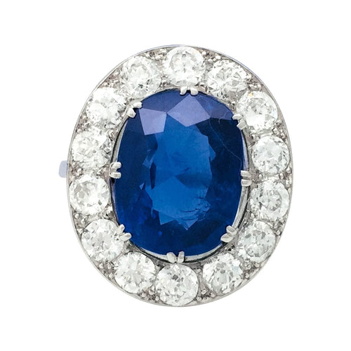 Bague 51 Bague en platine centrée d'un saphir de 6,06 carats, entourage diamants. 58 Facettes 28528