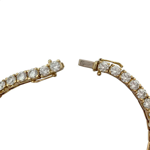 Bracelet Bracelet ligne "tennis" en or jaune serti de brillants. 58 Facettes 30035