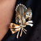 Broche Broche vintage bouquet or et diamants 58 Facettes 17-401